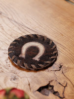 Bordskåner af koskind (2 stk.)